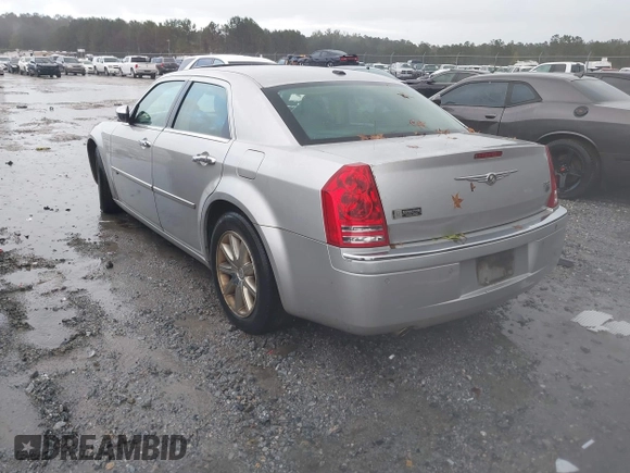 2010 Chrysler 300 C Hemi with VIN 2C3CA6CT5AH141439, listed as a IAAI auction lot 40797974 with 213,843 mi miles and . Bid and sale history available at carsss.com. Image 3.