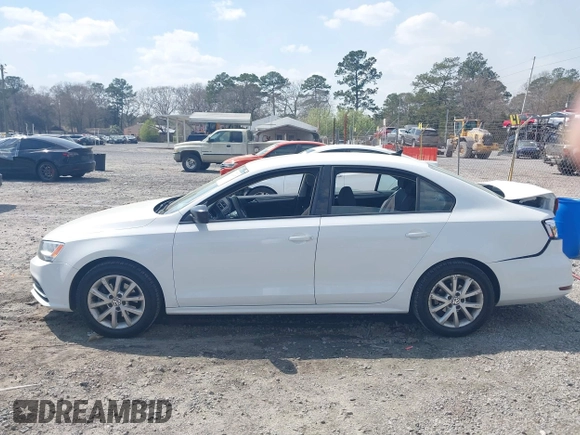 2015 Volkswagen Jetta Sedan 1.8T SE with VIN 3VWD17AJXFM249990, listed as a IAAI auction lot 41810073 with 127,683 mi miles. Bid and sale history available at carsss.com. Image 14.
