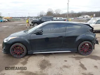 2013 Hyundai Veloster Turbo z VIN KMHTC6AE5DU151346, wystawiony jako IAAI lot #41177509 z przebiegiem 112 955 mil mil oraz . Historia ofert i sprzedaży dostępna na DreamBid. Obrazek 15.