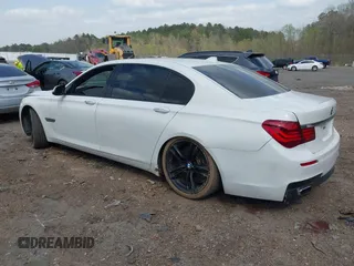 2015 BMW 7 Series 750Li with VIN WBAYE8C54FD780951, listed as a IAAI auction lot 41813038 with 103,131 mi miles. Bid and sale history available at carsss.com. Image 3.