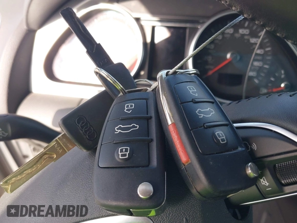 2014 Audi Q7 Premium Plus with VIN WA1LGAFE8ED007158, listed as a IAAI auction lot 42212664 with 120,934 mi miles and . Bid and sale history available at DreamBid. Image 11.
