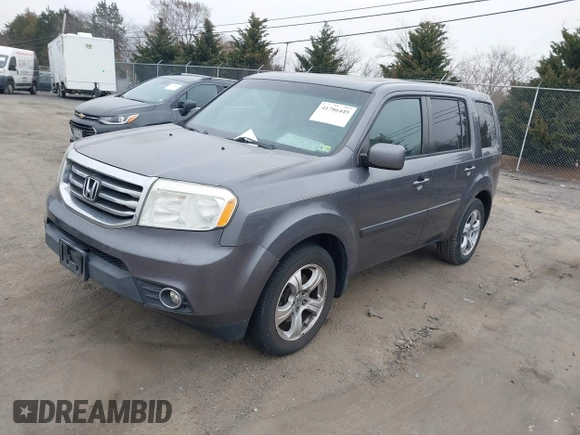 2015 Honda Pilot EX-L with VIN 5FNYF4H57FB035864, listed as a IAAI auction lot 41786445 with 139,787 mi miles and . Bid and sale history available at carsss.com. Image 2.