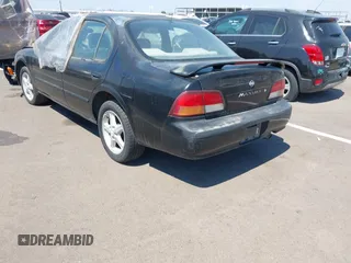 1998 Nissan Maxima GXE с VIN JN1CA21D7WM918565, выставлен на аукционе IAAI как лот 39656826 с пробегом 184 149 миль миль и . История ставок и продаж доступна на DreamBid. Изображение 3.
