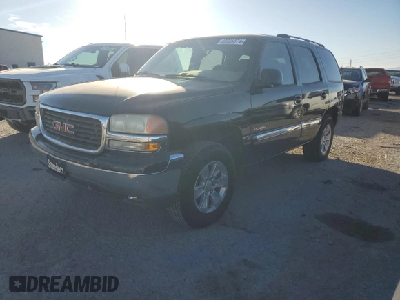 2004 GMC Yukon SLE with VIN 1GKEC13VX4R279540, listed as a Copart auction lot 82689874 with 250,179 mi miles and Salvage Title. Bid and sale history available at carsss.com. Image 1.