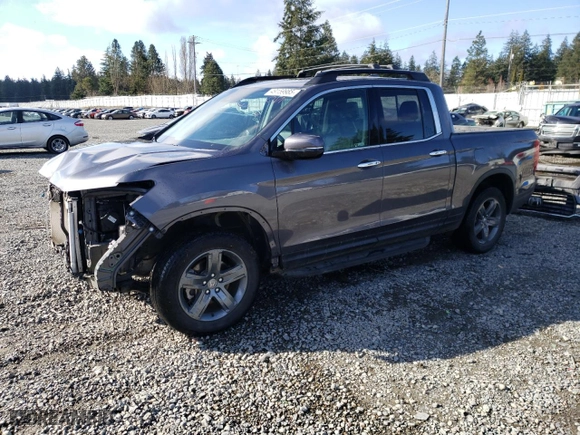 2021 Honda Ridgeline RTL-E with VIN 5FPYK3F7XMB016871, listed as a Copart auction lot 49159985 with 26,775 mi miles and Salvage Title. Bid and sale history available at carsss.com. Image 1.