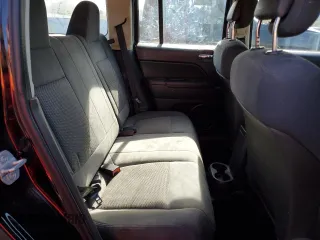 2010 Jeep Patriot Sport with VIN 1J4NF2GB0AD571175, listed as a Copart auction lot 54985195 with 112,365 mi miles and Clean Title. Bid and sale history available at carsss.com. Image 11.