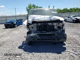 2009 Ford Econoline Cargo Commercial with VIN 1FTNE14W99DA93361, listed as a Copart auction lot 61009574 with 299,496 mi miles and Salvage Title. Bid and sale history available at DreamBid. Image 12.