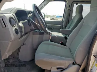 2009 Ford Econoline Passenger XL with VIN 1FBNE31L39DA56400, listed as a Copart auction lot 59878595 with 249,112 mi miles and Salvage title. Bid and sale history available at DreamBid. Image 7.