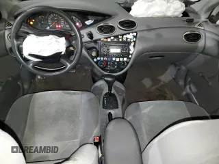 2002 Ford Focus LX with VIN 1FAFP33P52W126344, listed as a Copart auction lot 49757324 with 140,612 mi miles and Salvage Title. Bid and sale history available at DreamBid. Image 8.