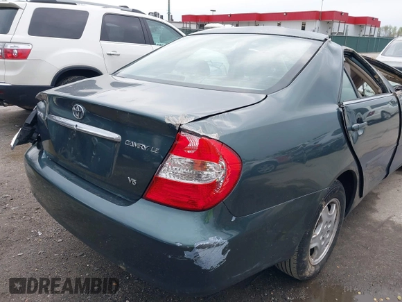 2002 Toyota Camry XLE z VIN 4T1BF32K02U522335, wystawiony jako IAAI lot #42037459 z przebiegiem 214 832 mil mil oraz . Historia ofert i sprzedaży dostępna na DreamBid. Obrazek 14.