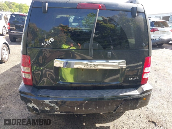 2008 Jeep Liberty Sport with VIN 1J8GP28KX8W227953, listed as a IAAI auction lot 42049588 with 310,901 mi miles. Bid and sale history available at carsss.com. Image 6.
