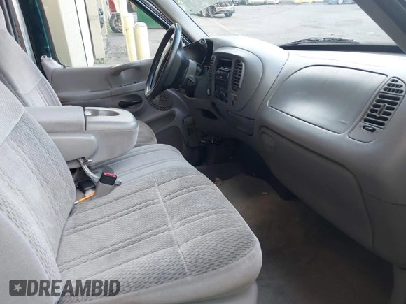 1997 Ford F-150 XL with VIN 1FTEX18L1VKB44867, listed as a IAAI auction lot 41266572 with 105,061 mi miles. Bid and sale history available at carsss.com. Image 5.
