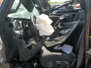 2023 Jeep Gladiator Sport S z VIN 1C6HJTAGXPL573758, wystawiony jako Copart lot #56635955 z przebiegiem Nie podano mil oraz Szkoda całkowita • Salvage title. Historia ofert i sprzedaży dostępna na DreamBid. Obrazek 7.