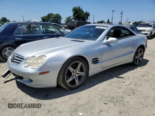 2003 Mercedes-Benz SL 500 z VIN WDBSK75F73F020691, wystawiony jako Copart lot #65954785 z przebiegiem Nie podano mil oraz Czysty tytuł • Clean title. Historia ofert i sprzedaży dostępna na DreamBid. Obrazek 1.