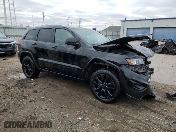 2017 Jeep Grand Cherokee Laredo with VIN 1C4RJFAG1HC744624, listed as a Copart auction lot 51150755 with 113,249 mi miles and Salvage Title. Bid and sale history available at carsss.com. Image 4.