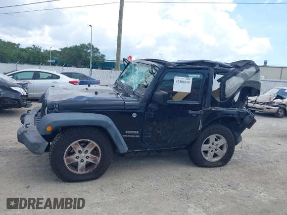 2015 Jeep Wrangler Freedom Edition with VIN 1C4AJWAG4FL681688, listed as a IAAI auction lot 42488018 with Not provided miles and . Bid and sale history available at DreamBid. Image 14.