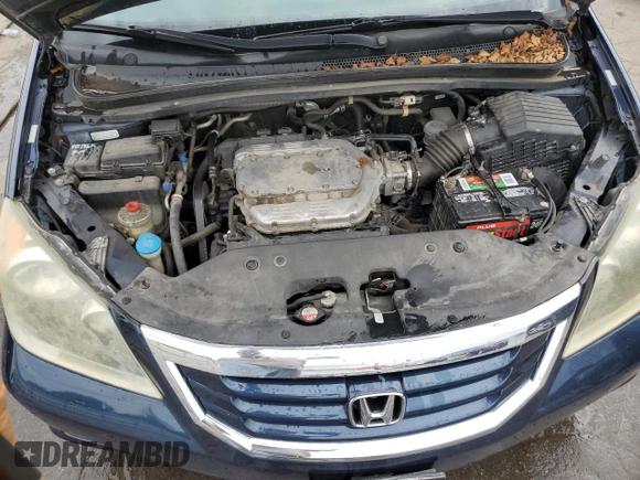 2010 Honda Odyssey EX-L z VIN 5FNRL3H76AB071109, wystawiony jako Copart lot #70342294 z przebiegiem 187 872 mil mil oraz Szkoda całkowita • Salvage title. Historia ofert i sprzedaży dostępna na DreamBid. Obrazek 12.