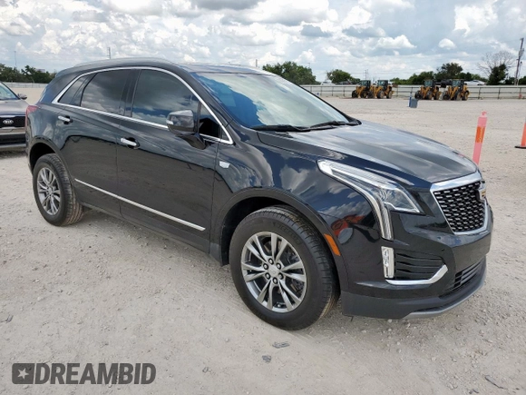 2021 Cadillac XT5 FWD Premium Luxury with VIN 1GYKNCRS0MZ100515, listed as a Copart auction lot 62856785 with 50,298 mi miles and Salvage title. Bid and sale history available at DreamBid. Image 4.