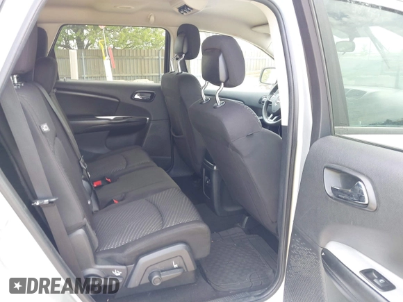 2014 Dodge Journey SXT with VIN 3C4PDCBG9ET209357, listed as a IAAI auction lot 42257467 with 121,786 mi miles and . Bid and sale history available at DreamBid. Image 8.