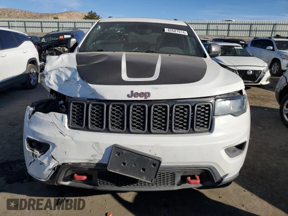 2021 Jeep Grand Cherokee Trailhawk with VIN 1C4RJFLG3MC646573, listed as a Copart auction lot 82687014 with 83,294 mi miles and Salvage Title. Bid and sale history available at carsss.com. Image 5.
