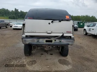2002 GMC Yukon SLT with VIN 1GKEK13V02J208958, listed as a Copart auction lot 70342704 with 0 mi miles and Salvage Title. Bid and sale history available at carsss.com. Image 6.