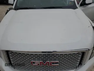 2016 GMC Yukon Denali with VIN 1GKS2CKJ8GR271098, listed as a Copart auction lot 42983315 with 109,582 mi miles and Salvage Title. Bid and sale history available at carsss.com. Image 12.