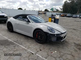 2022 Porsche 911 Carrera S with VIN WP0CB2A97NS244840, listed as a Copart auction lot 49349563 with 1,465 mi miles. Bid and sale history available at carsss.com. Image 4.