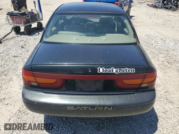 2002 Saturn SL с VIN 1G8ZK52732Z230147, выставлен на аукционе Copart как лот 57053055 с пробегом 168 612 миль миль и Чистый • Clean title. История ставок и продаж доступна на DreamBid. Изображение 6.