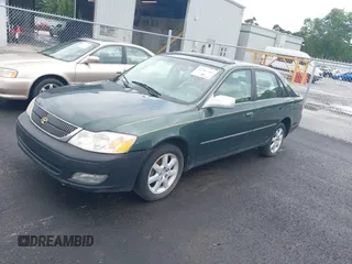 2000 Toyota Avalon XL z VIN 4T1BF28B6YU036865, wystawiony jako IAAI lot #42402305 z przebiegiem 202 265 mil mil oraz . Historia ofert i sprzedaży dostępna na DreamBid. Obrazek 2.