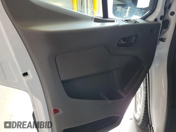 2023 Ford Transit Cargo with VIN 1FTBR1X86PKB99022, listed as a IAAI auction lot 42841650 with 14,234 mi miles and . Bid and sale history available at DreamBid. Image 7.