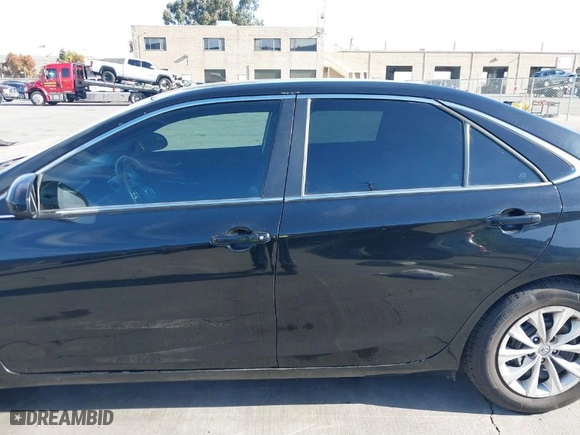 2015 Toyota Camry Hybrid LE with VIN 4T1BD1FK0FU153311, listed as a IAAI auction lot 40847865 with 417,133 mi miles. Bid and sale history available at carsss.com. Image 15.