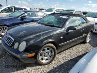 1999 Mercedes-Benz CLK 320/430 with VIN WDBLK65G1XT027392, listed as a Copart auction lot 74272214 with Not Provided miles and Salvage Title. Bid and sale history available at carsss.com. Image 1.