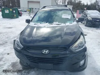 2015 Hyundai Tucson SE with VIN KM8JU3AG2FU103035, listed as a IAAI auction lot 41592256 with 105,792 mi miles. Bid and sale history available at carsss.com. Image 12.