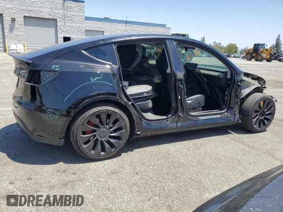 2022 Tesla Model Y Performance z VIN 7SAYGDEF2NF443037, wystawiony jako Copart lot #56870145 z przebiegiem 51 897 mil mil oraz Szkoda całkowita • Salvage title. Historia ofert i sprzedaży dostępna na DreamBid. Obrazek 3.