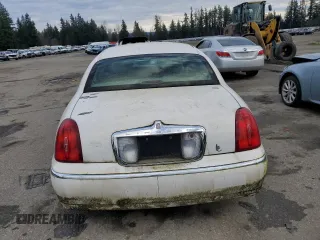 2001 Lincoln Town Car Executive z VIN 1LNHM81W91Y729914, wystawiony jako Copart lot #41593085 z przebiegiem 144 950 mil mil oraz Czysty tytuł • Clean title. Historia ofert i sprzedaży dostępna na DreamBid. Obrazek 6.