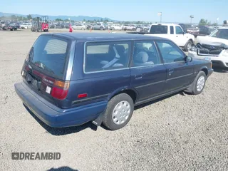 1991 Toyota Camry z VIN JT2SV21W3M0389983, wystawiony jako IAAI lot #42448678 z przebiegiem 312 034 mil mil oraz . Historia ofert i sprzedaży dostępna na DreamBid. Obrazek 4.