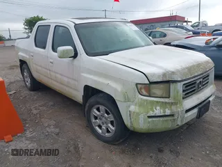 2006 Honda Ridgeline RTL with VIN 2HJYK16506H544391, listed as a IAAI auction lot 42693779 with 309,147 mi miles and . Bid and sale history available at DreamBid. Image 1.