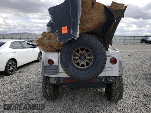 2003 Jeep Wrangler Sport with VIN 1J4FA49SX3P369375, listed as a Copart auction lot 71309184 with 0 mi miles and Salvage Title. Bid and sale history available at carsss.com. Image 6.
