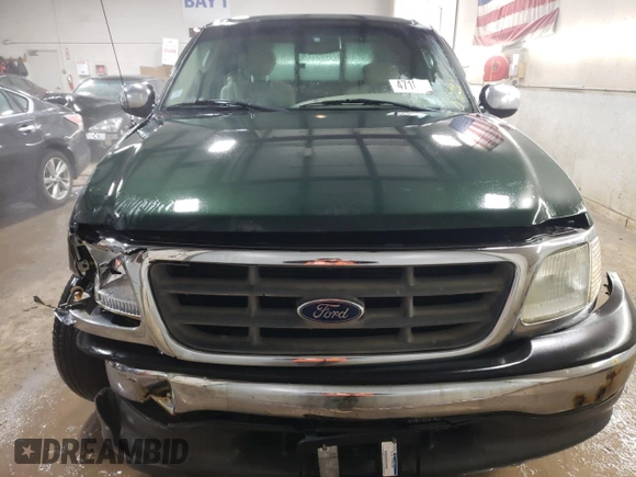 2002 Ford F-150 XL with VIN 1FTRX17L22NB97610, listed as a Copart auction lot 47186355 with 70,767 mi miles and Salvage title. Bid and sale history available at DreamBid. Image 5.