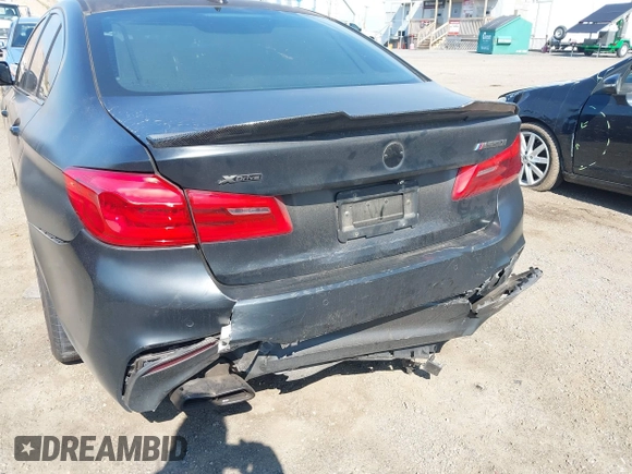 2018 BMW 5 Series M550i xDrive with VIN WBAJB9C55JB286747, listed as a IAAI auction lot 42583106 with 141,102 mi miles and . Bid and sale history available at DreamBid. Image 17.