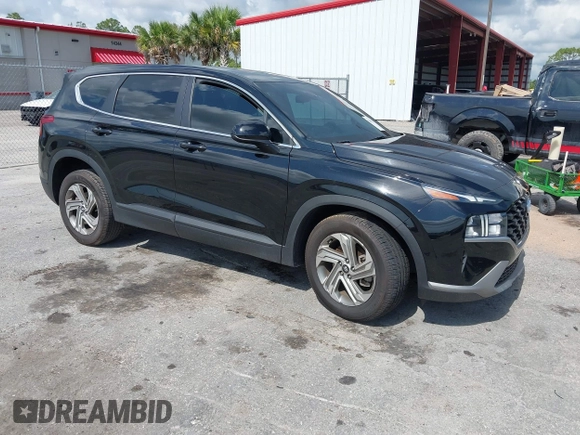 2021 Hyundai Santa Fe SE z VIN 5NMS14AJ0MH332918, wystawiony jako IAAI lot #42365534 z przebiegiem 58 720 mil mil oraz . Historia ofert i sprzedaży dostępna na DreamBid. Obrazek 1.