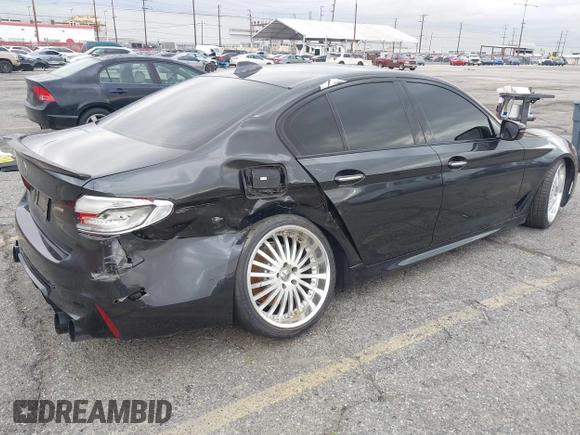 2017 BMW 5 Series 540i with VIN WBAJE5C32HG913769, listed as a IAAI auction lot 41542932 with 73,895 mi miles and . Bid and sale history available at carsss.com. Image 4.
