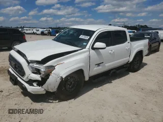2023 Toyota Tacoma SR5 z VIN 3TMAZ5CN2PM215711, wystawiony jako Copart lot #55129235 z przebiegiem 22 831 mil mil oraz Szkody całkowita. Historia ofert i sprzedaży dostępna na DreamBid. Obrazek 1.