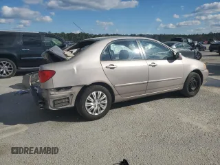2003 Toyota Corolla CE with VIN 1NXBR32E33Z185243, listed as a Copart auction lot 48849085 with 257,556 mi miles and Salvage Title. Bid and sale history available at DreamBid. Image 3.