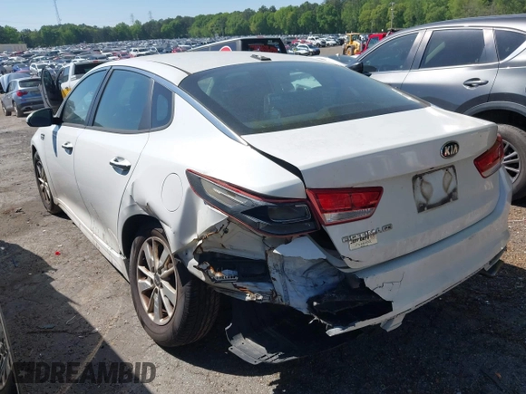 2017 Kia Optima LX with VIN 5XXGT4L32HG156781, listed as a IAAI auction lot 42044826 with 295,162 mi miles and . Bid and sale history available at carsss.com. Image 3.