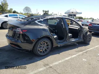 2019 Tesla Model 3 Mid Range z VIN 5YJ3E1EA8KF306096, wystawiony jako Copart lot #54790755 z przebiegiem 170 775 mil mil oraz Szkody całkowita. Historia ofert i sprzedaży dostępna na DreamBid. Obrazek 3.