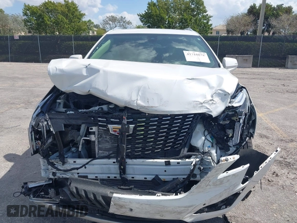 2020 Cadillac XT5 Premium Luxury FWD with VIN 1GYKNCRS7LZ129119, listed as a IAAI auction lot 41710878 with 52,575 mi miles and . Bid and sale history available at carsss.com. Image 12.