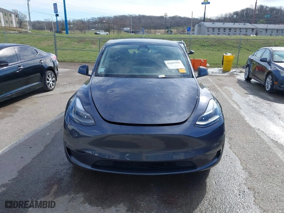 2023 Tesla Model Y Long Range with VIN 7SAYGDEE3PA204992, listed as a IAAI auction lot 41849104 with 22,490 mi miles. Bid and sale history available at carsss.com. Image 12.