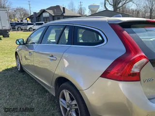 2015 Volvo V60 T5 Drive-E Premier with VIN YV140MEK6F1245353, listed as a IAAI auction lot 41713825 with 131,682 mi miles. Bid and sale history available at carsss.com. Image 3.