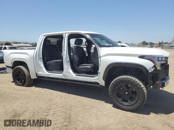 2022 Toyota Tundra Platinum with VIN 5TFNA5DB6NX003415, listed as a Copart auction lot 60794455 with 52,022 mi miles and Salvage title. Bid and sale history available at DreamBid. Image 4.